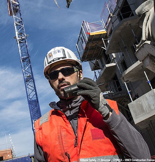 Man with protective helmet and glasses